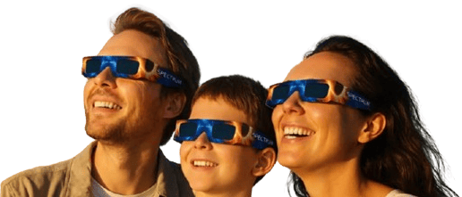 Family wearing ISO-certified solar eclipse glasses and smiling while looking up, linking to the official order page for eclipse protection in Spain.